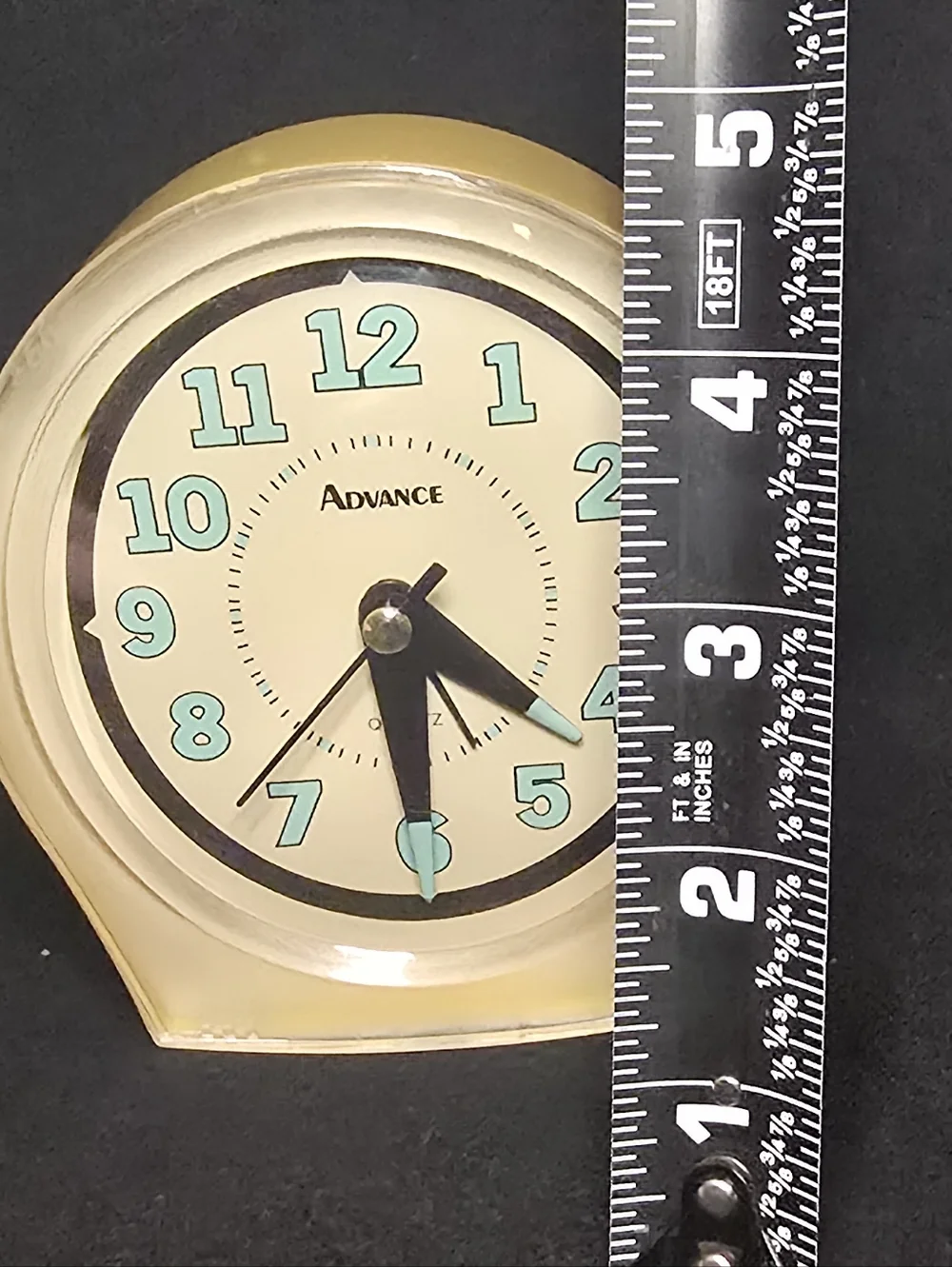 Advance Yellow Clock with Aqua Numerals